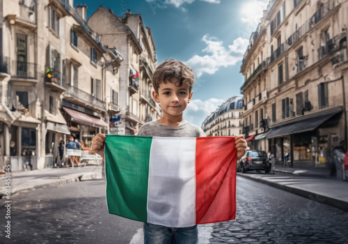 Italian boy holding Italy flag in Roma
