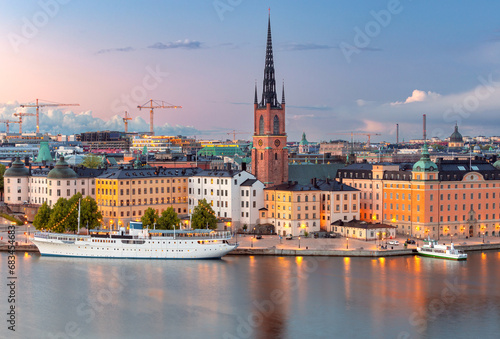 View of the city courthouse and the bell tower of Riddarholmen Church in Stockholm. photo