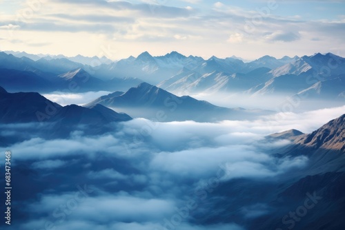 Mountains Pierced Through The Fluffy White Clouds © Anastasiia