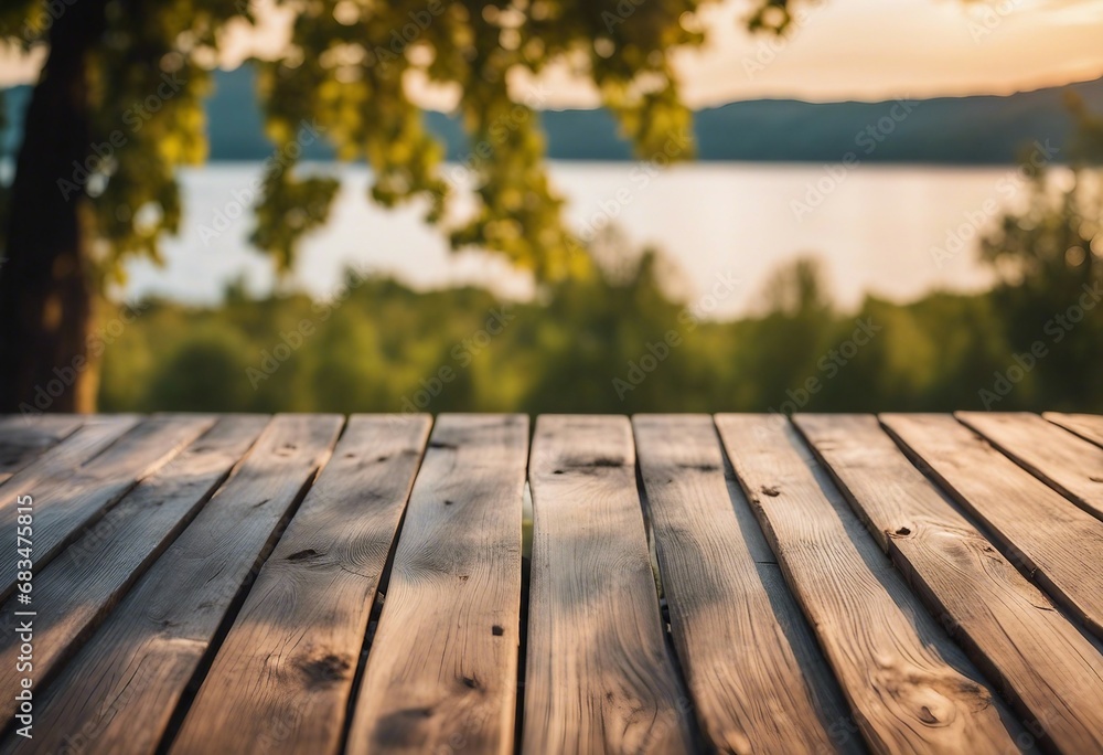 Empty wooden table top with blurred nature background Calm sunny evening in nature with view to lake or river Empty wooden table top with blurred nature background Calm sunny evening in nature with view to lake or river