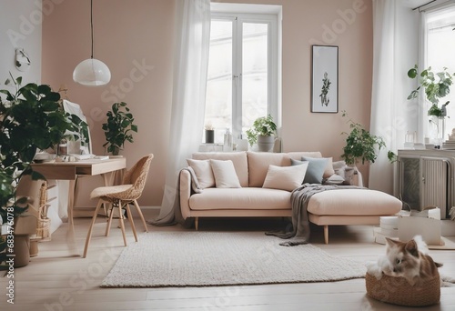 Scandinavian style small studio apartment with stylish design in light pastel colors with big window and working table