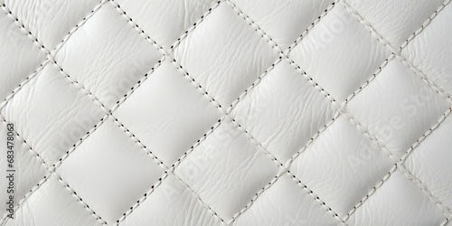  white leather texture with visible stitching. © RMedia
