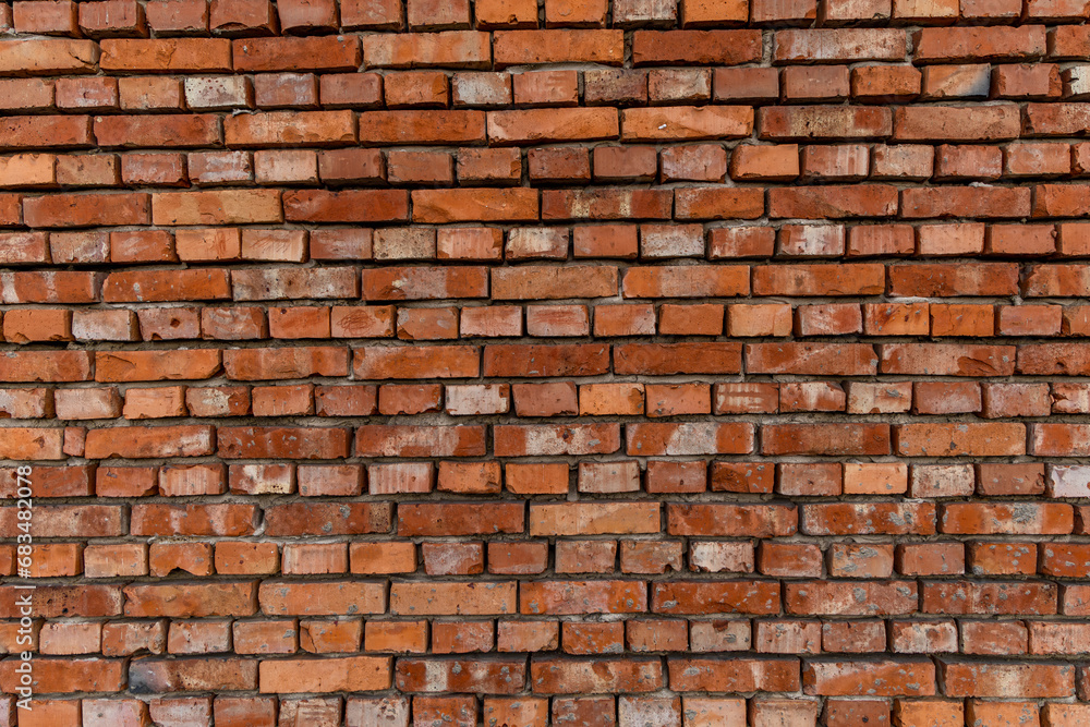 Red brick building scheduled for demolition, wrongly placed wall by the bricklayer Red brick building scheduled for demolition, wrongly placed wall by the bricklayer