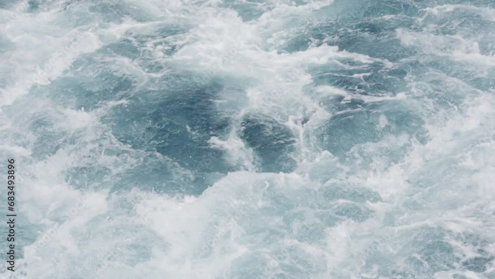 Background set, A dynamic scene unfolds as an ocean wave surges alongside a boat's motor. The power of the sea and the boat's propulsion create a blend of water and motion. High quality 4k footage Background set, A dynamic scene unfolds as an ocean wave surges alongside a boat's motor. The power of the sea and the boat's propulsion create a blend of water and motion. High quality 4k footage