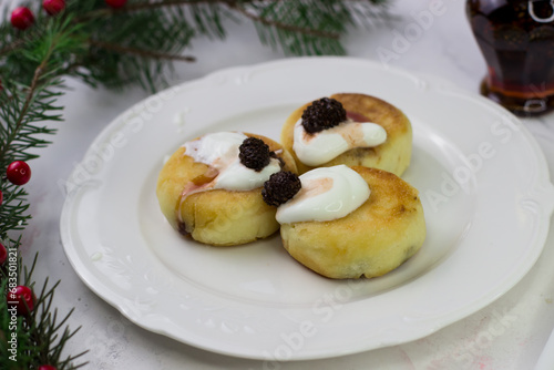 Apetite cheesecakes on a white plate. Christmas Breakfast photo