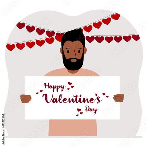 Happy man holding a poster with text Happy Valentine's Day and red hearts. Love concept. Happy Valentine's Day wallpaper, poster, postcard or congratulation.