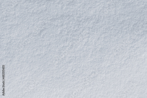 Snow texture. White surface of snow with clearly defined texture © Volodymyr