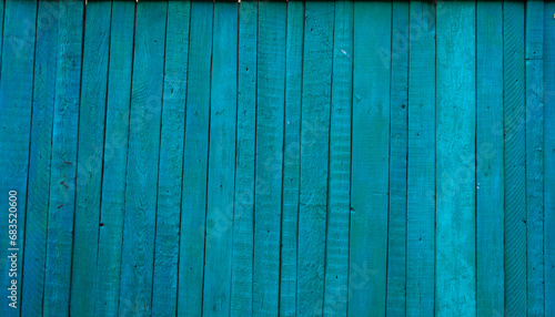 Close-up, vertical blue wooden planks. Detailed texture