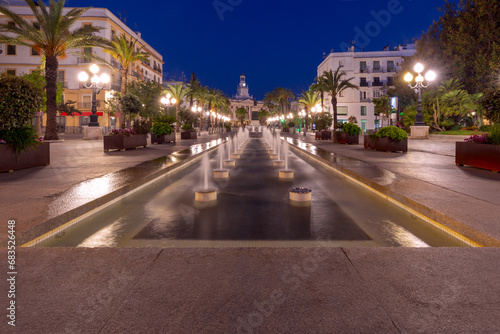 Fototapeta Naklejka Na Ścianę i Meble -  San Juan de Dios square in Cadiz at dawn.