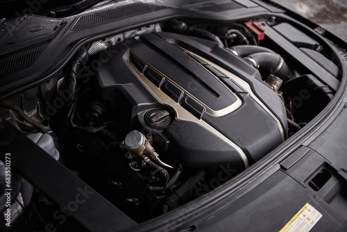 Car engine with opened hood. Car service background © Studio-M
