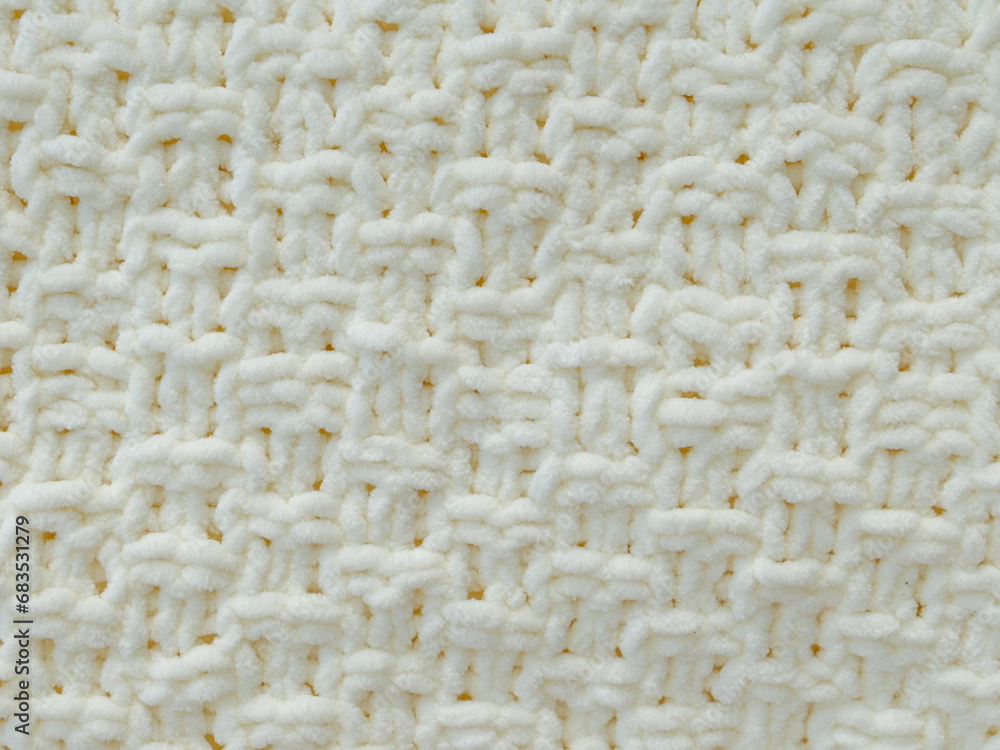 Background of white knitted plaid. Background of white knitted plaid.