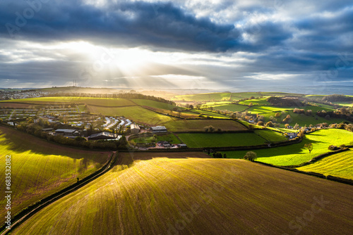 Lights and Shadows over Fields and Farms from a drone, Devon, England, Europe photo