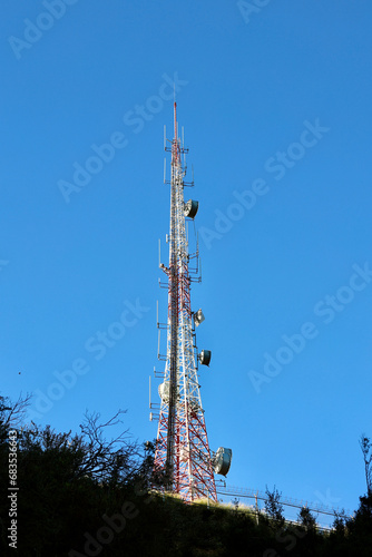 telecommunication tower with satellite dishes