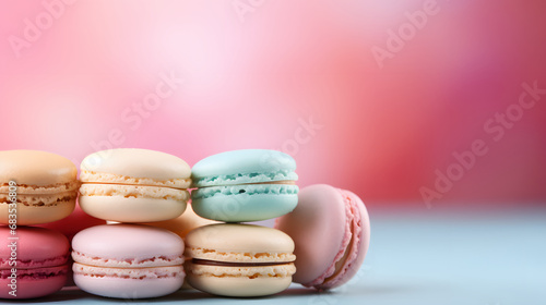 Macaroons Background with a place to copy, pastel colors. Delicious dessert. Cookies, pastries, flour products.
