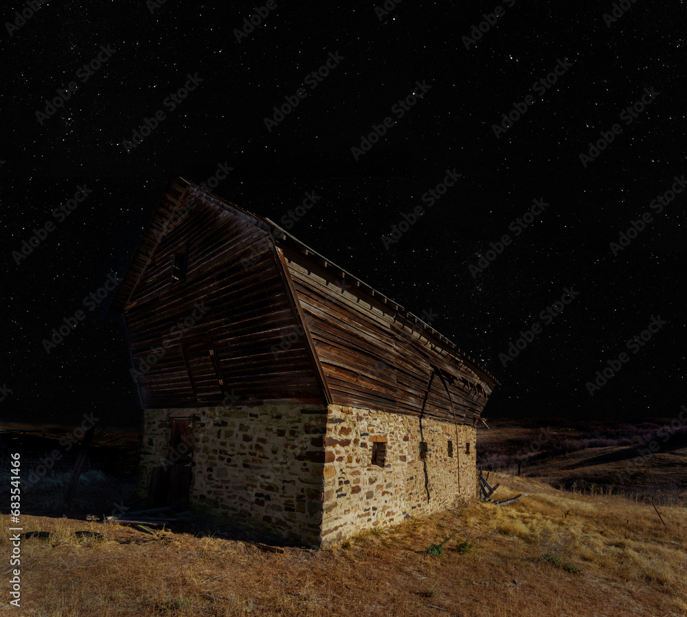 Starry skies abovve an old stable