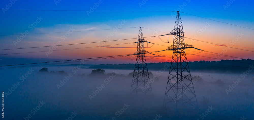 Morning Silhouettes: Power Lines Dance Against the Dawn Sky