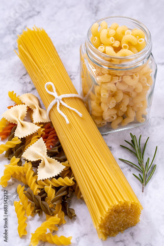 Raw pasta, spaghetti and other forms photo