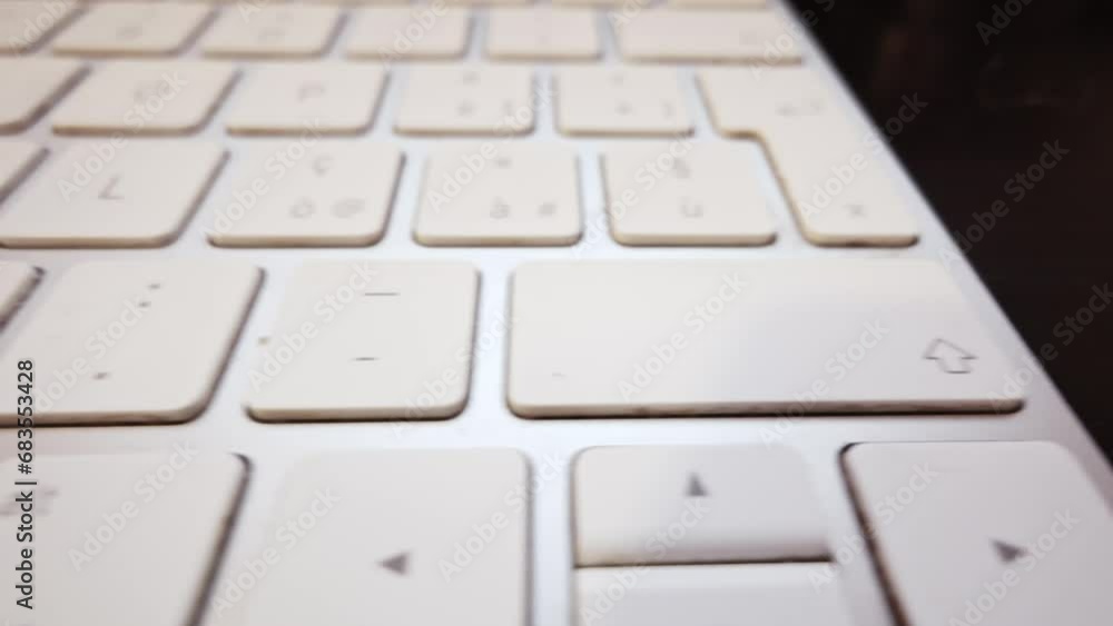 A close-up view of a computer keyboard unveils touch-sensitive keys, each bearing the marks of innumerable taps, encapsulating the spirit of digital efficiency and connectivity A close-up view of a computer keyboard unveils touch-sensitive keys, each bearing the marks of innumerable taps, encapsulating the spirit of digital efficiency and connectivity