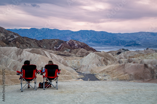 Zabriskie Point. It is a part of the Amargosa Range located east of Death Valley in Death Valley National Park in California, United States. People Are Watching Sunset. USA photo