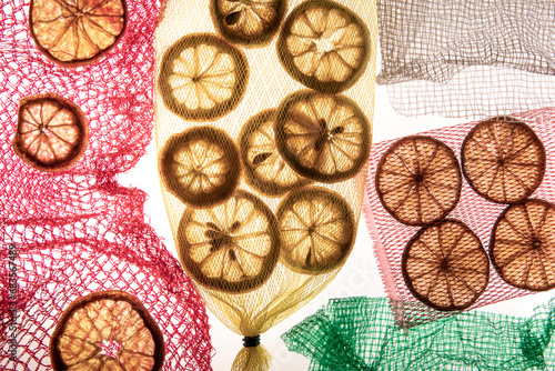 Lemon Slices in colorful mesh bags photo