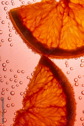 Close-up Orange slices in bubbly water