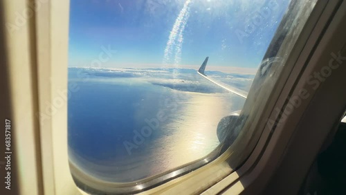 Window view from a Ryanair flight flying over the Mediterranean Sea