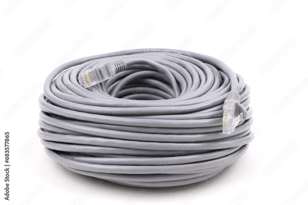 Roll of internet data cable isolated on a white background. Grey network cable. Roll of internet data cable isolated on a white background. Grey network cable.