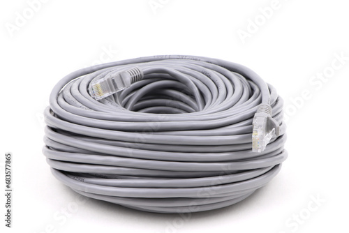 Roll of internet data cable isolated on a white background. Grey network cable.
