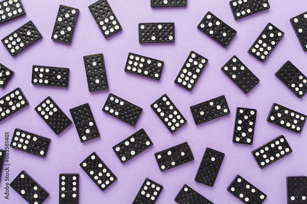 Black domino tiles on color background, top view Black domino tiles on color background, top view