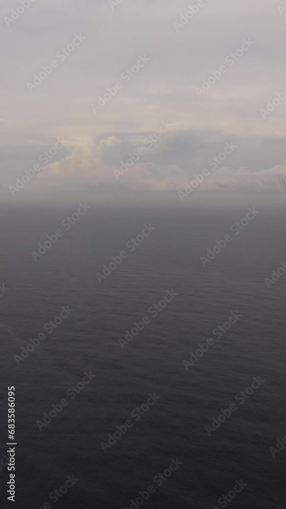 Ocean sunset over the calm water surface view from above. Ocean sunset over the calm water surface view from above.