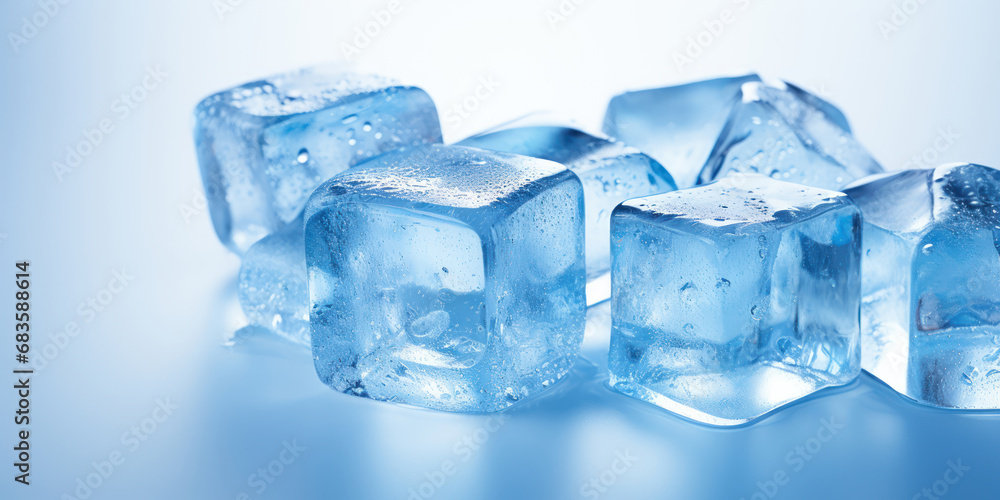 Vibrant blue ice cubes stand out against a backdrop of soft grey Vibrant blue ice cubes stand out against a backdrop of soft grey