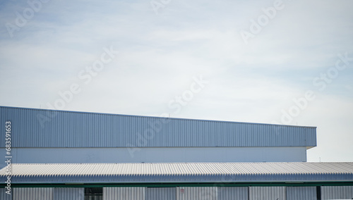 ฺฺBuilding and steel structure factory with the blue sky, The roof of the factory.