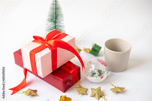 Christmas elements, gifts, fir branches, red decorations on white background. Christmas concept, winter, new year