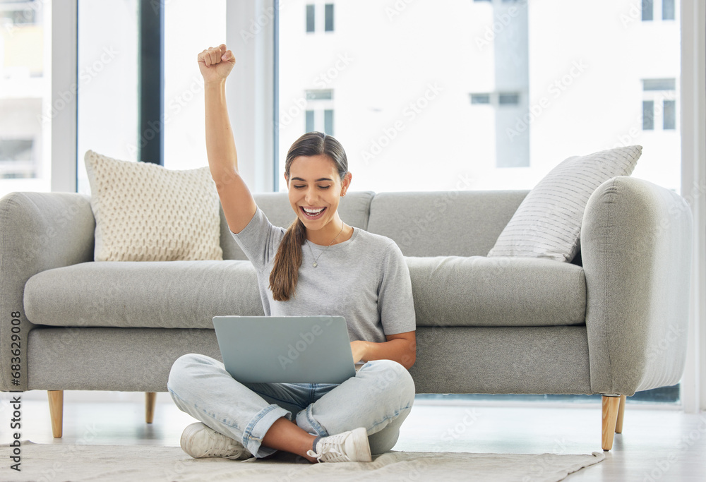 Winner woman, laptop and fist on floor for success, goal or bonus in trading, stock market or deal. Girl, computer and happy in home living room for cheers, invest or yes for profit, revenue or lotto Winner woman, laptop and fist on floor for success, goal or bonus in trading, stock market or deal. Girl, computer and happy in home living room for cheers, invest or yes for profit, revenue or lotto