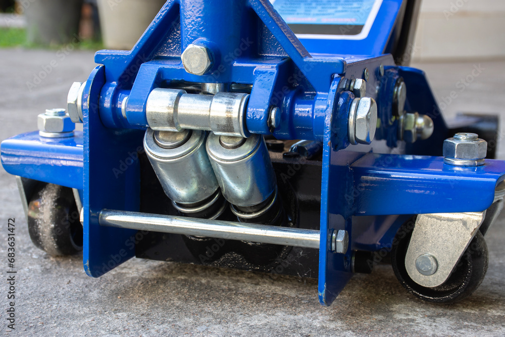 Double cylinder hydraulic system of car hydraulic floor jack , Car tools concept Double cylinder hydraulic system of car hydraulic floor jack , Car tools concept