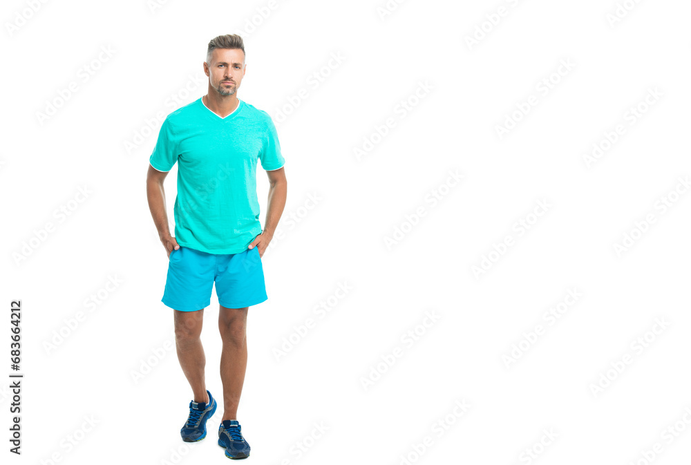 Sport and healthy lifestyle, copy space. full length of athlete. confident athlete wear sport wear standing alone. The male sport athlete in studio. sport athlete with fit body isolated against white Sport and healthy lifestyle, copy space. full length of athlete. confident athlete wear sport wear standing alone. The male sport athlete in studio. sport athlete with fit body isolated against white