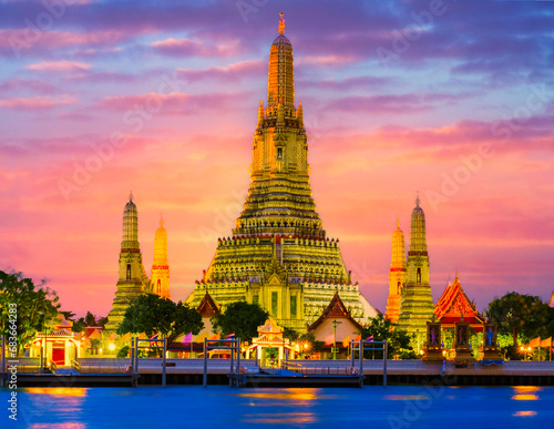 Wat Arun Temple Bangkok Thailand, Temple of Dawn, a Buddhist temple alongside the Chao Phraya River. Beautiful Wat Arun at dusk evening sunset