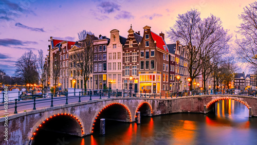 Photography Amsterdam at sunset with colorful houses at the Amsterdam canals in the Netherlands