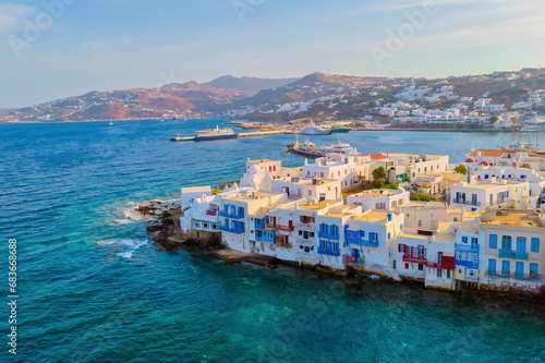 Fototapeta Naklejka Na Ścianę i Meble -  Drone view of Mykonos Greek village in Greece, colorful streets of Mikonos village. Little Venice Mykonos town