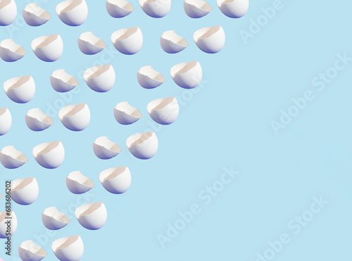 Eggshells on the blue background. Minimal creative concept. Easter pattern. Copy space.