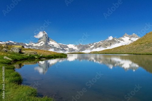 Beautiful Swiss Alps landscape with Stellisee lake and Matterhorn mountain reflection in water, summer mountains view, Zermatt, Switzerland 