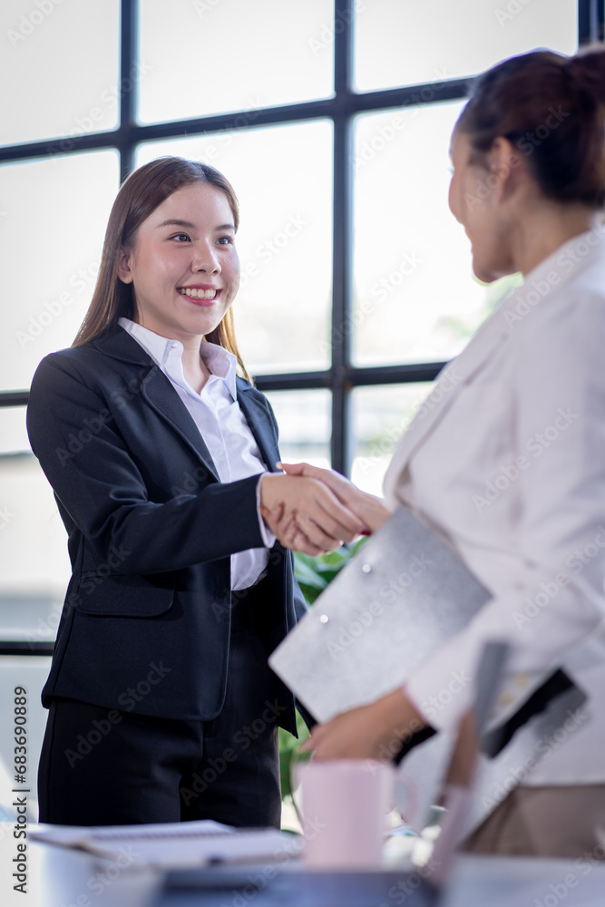 Business woman offer and give hand for handshake in office. Successful job interview. Apply for loan in bank. Salesman, bank worker or lawyer shake for deal, agreement or sale. Increase of salary. Business woman offer and give hand for handshake in office. Successful job interview. Apply for loan in bank. Salesman, bank worker or lawyer shake for deal, agreement or sale. Increase of salary.
