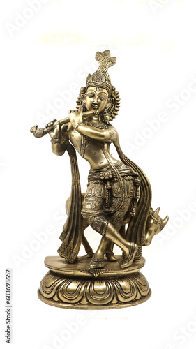 golden statue of lord krishna crafted with details, an avatar of vishnu, playing flute music near a cow in a dancing position, front view isolated in a white background