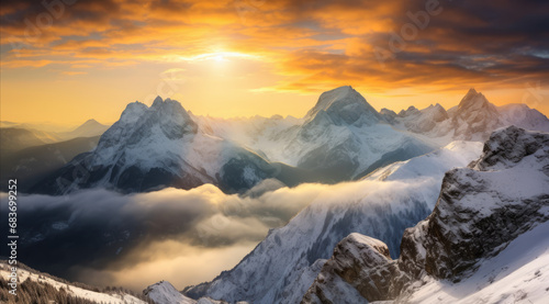 The sun bursts over the horizon, lighting up the alpine peaks. © Jan