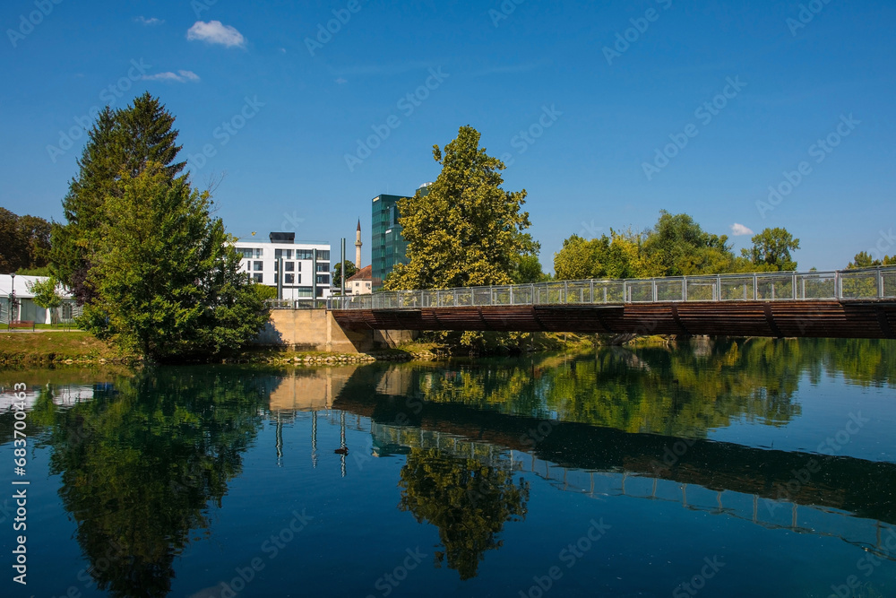 Obraz premium Smaragdni Most Bridge crossing the River Una in central Bihac, Una-Sana Canton, Federation of Bosnia and Herzegovina