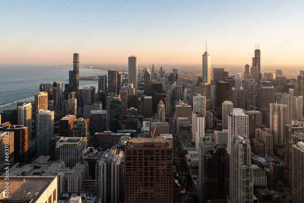 Chicago skyline aerial view during golden hour, lake Michigan