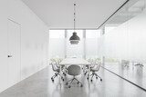 White glass office meeting room interior with table and chairs, panoramic window