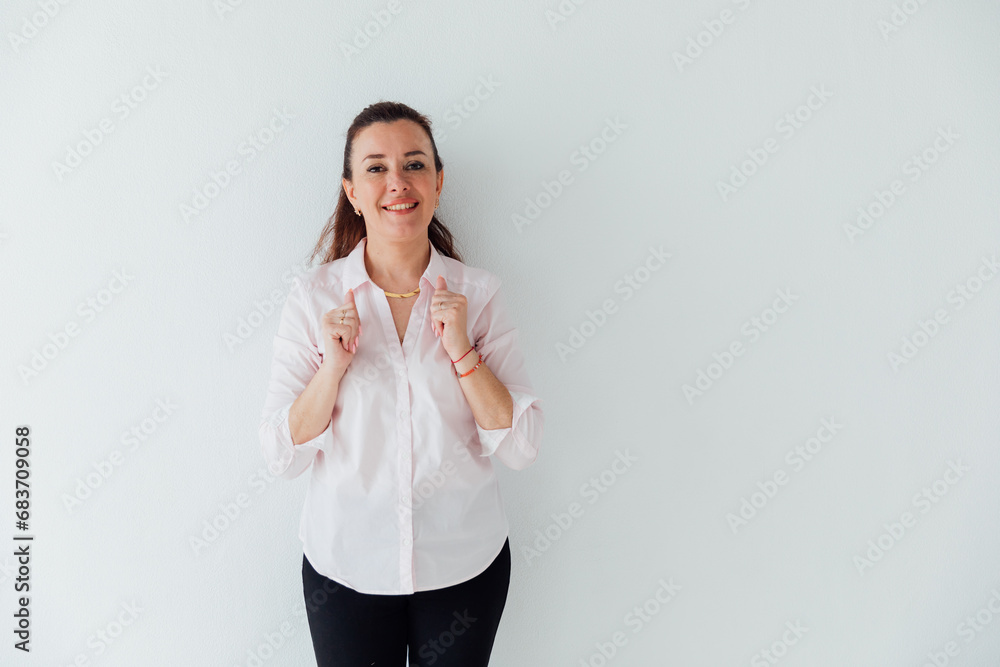 Beautiful woman in business suit in office on white background Beautiful woman in business suit in office on white background