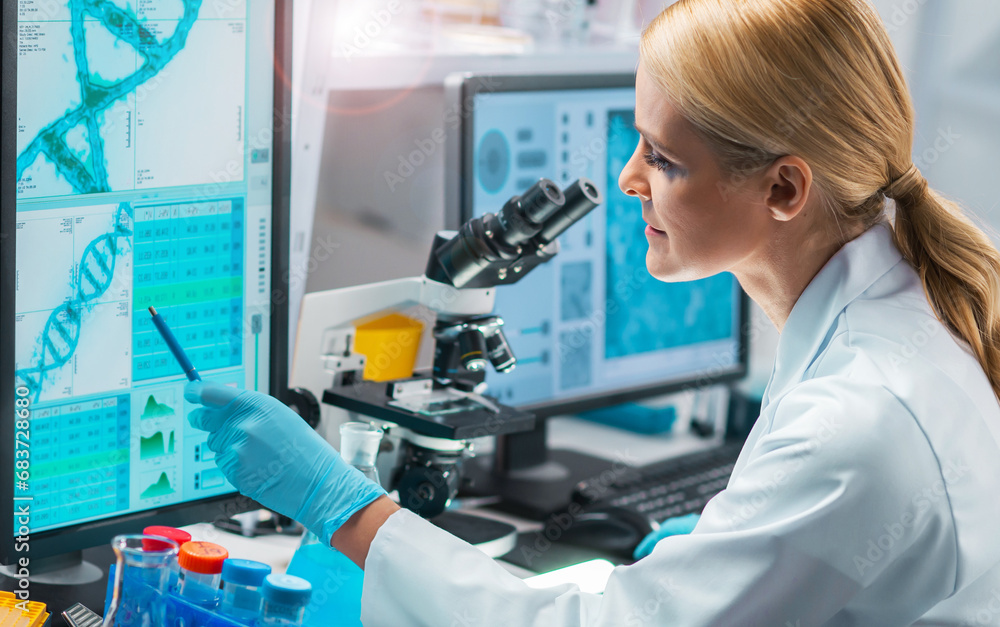 Professional female scientist is working on a vaccine in a modern scientific research laboratory. Laboratory tools: microscope, test tubes, equipment. Future technology, healthcare and science. Professional female scientist is working on a vaccine in a modern scientific research laboratory. Laboratory tools: microscope, test tubes, equipment. Future technology, healthcare and science.
