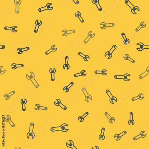 Blue line Adjustable wrench icon isolated seamless pattern on yellow background. Vector